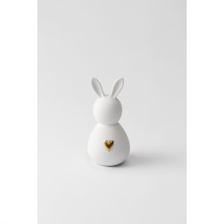 kleiner rundlicher Porzellanhase in weiß mit goldenem Herz auf dem Bauch