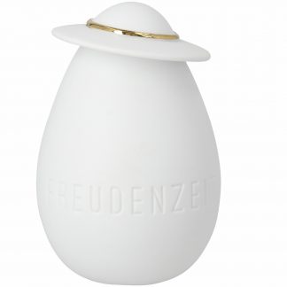 weißes Porzellanei unglasiert mit Prägung im unteren Bereich "Freudentanz" und leicht schräg aufgesetztem Hut mit Goldkante - hier Vorderansicht